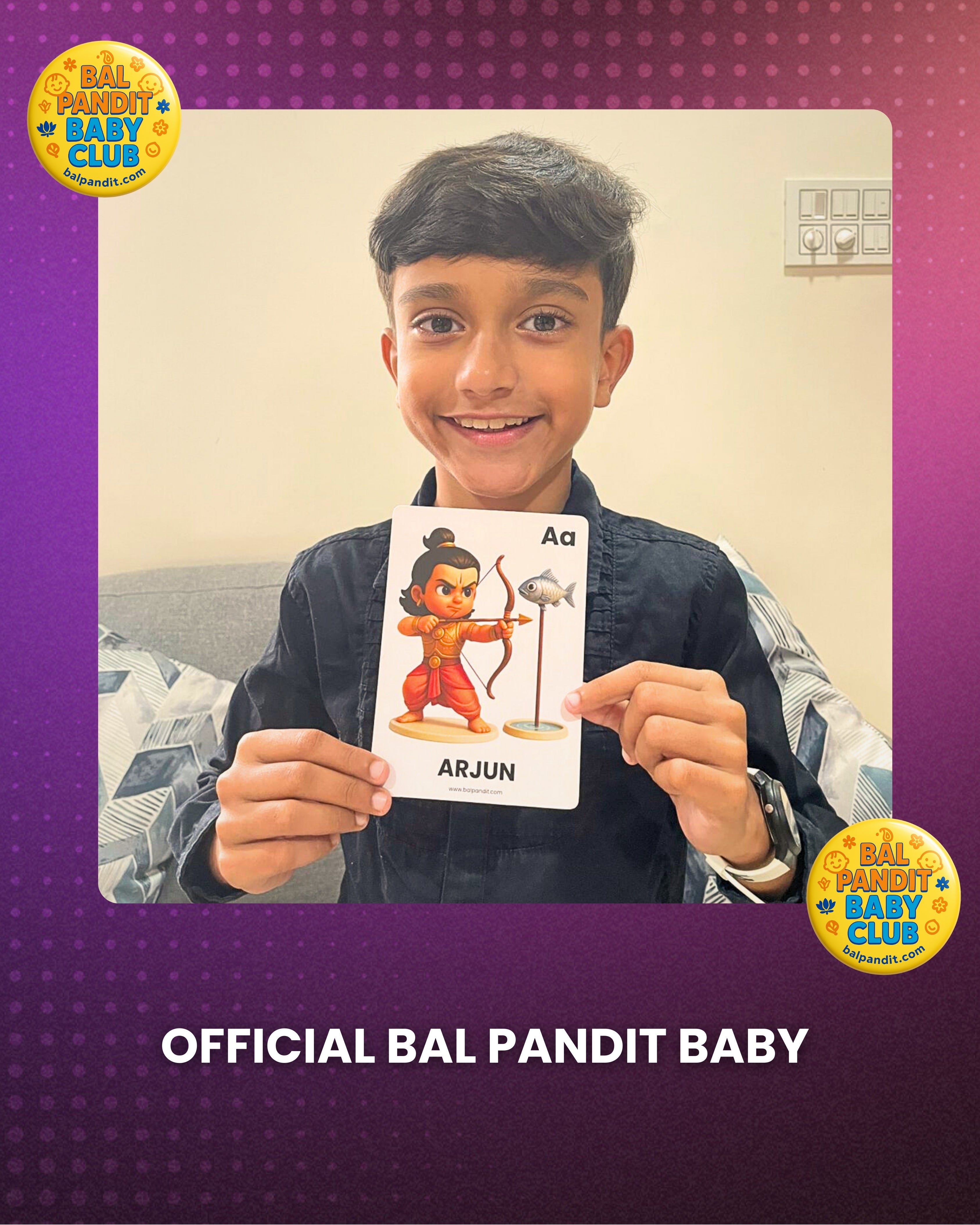 A Bal Pandit learner proudly holding an Arjun alphabet flashcard